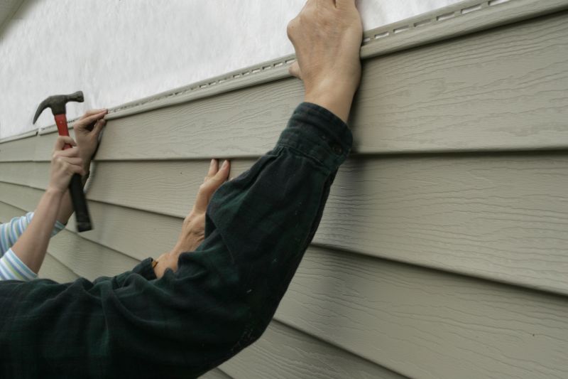 Professional Siding Installation in Progress